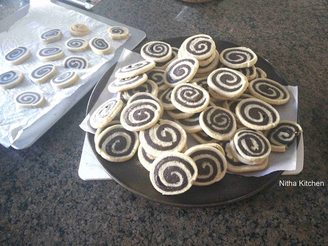 pinwheel cookies, vanilla pinwheel cookies, vanilla chocolate pinwheel cookies recipe, pinwheel cookies recipe, eggless pinwheel cookies, easy christmas cookies recipe