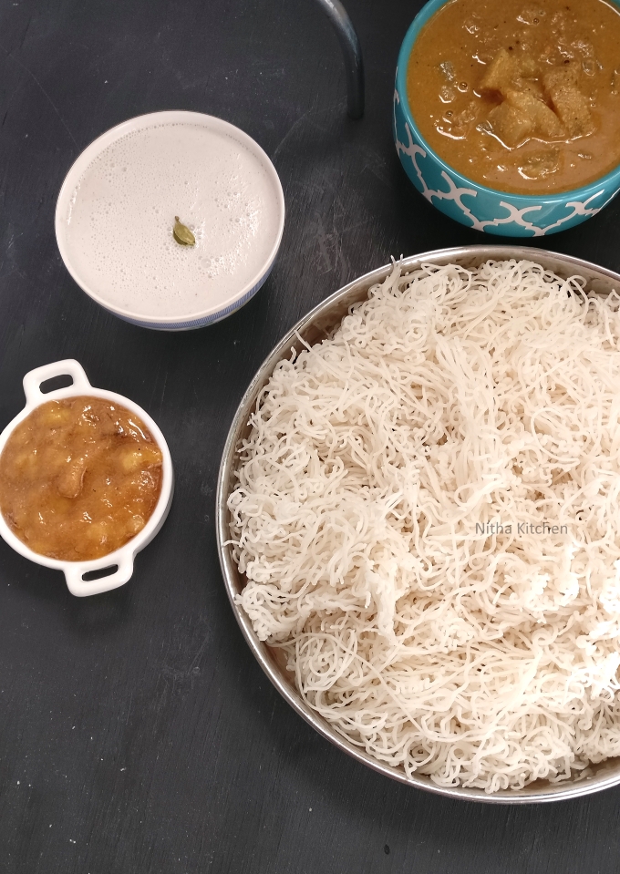 Kongunadu Sandhagai Idiyappam Recipe , authentic rice flour sevaai sev with step by step pictures, authentic sevaai sev with step by step pictures, brahmin sevai recipe, classic sandhagai with coconut milk and panchamirtham, Festive Specials, gluten and vegan recipe rice flour recipes, gluten and vegan recipe too, gluten free nool puttu, Gluten Free Recipes, how to use electric steamer for idiyappam, Idiyappam, idli rice sandhagai video recipe, Kids n Infant Corner, kongunadu sandagai video recipe, kongunadu sandhagam video recipe, Lunch Box Specials, Malayalam: ഇടിയപ്പം, Nitha Kitchen, nitha kitchen recipes, nool puttu with thengaai paal video recipe, Party/Get together Veg Menus, patti Idiyappam press images, putu mayam in Malaysian and putu mayang in Indonesian., recipe for santhavai, sandhagai thengaai paal, shavige, Sinhalese: ඉඳිආප්ප), steamed healthy, steamed string hopper recipe, step wise pictures, Tiffin Varieties, Traditional and Instant Sandhagai/Idiyappam/string hoppers video recipe served with coconut milk and panchamirtham, Traditional Kongu Foods, Traditional n Instant Sandhagai/Idiyappam/string hoppers served with coconut milk and panchamirtham, இடியப்பம், இடியாப்பம், നൂൽപുട്ട്. Kannada: ಇಡಿಯಪ್ಪಂ