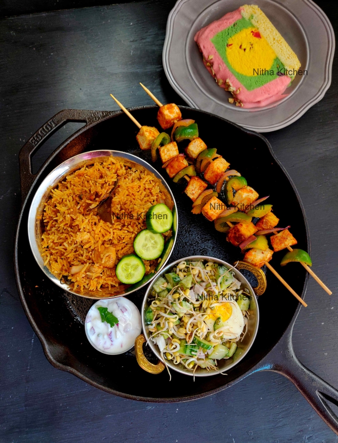 Nitha Kitchen lunch served Mushroom biryani, Moong Sprouts, Tofu Tikka and Cassata Ice Cream